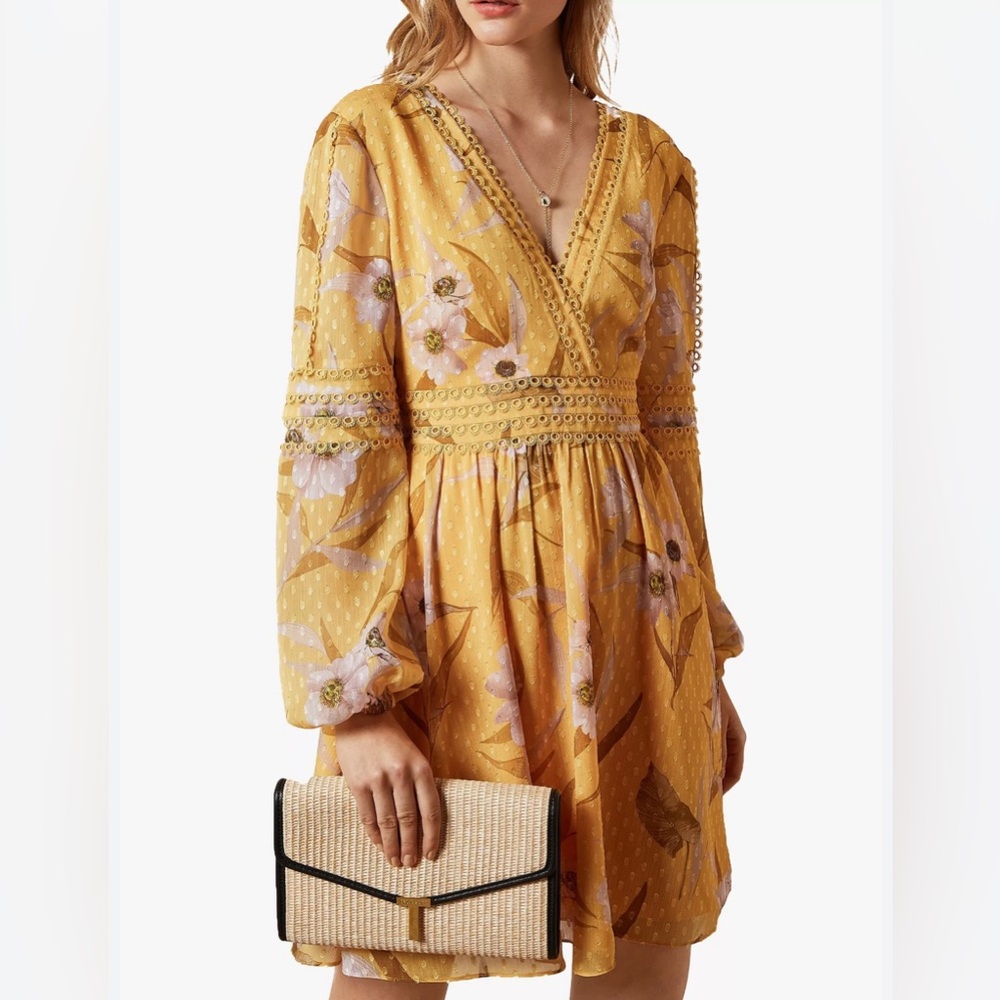 Ted Baker-Yellow mini with pink floral print and eyelet crochet trim.Size 10